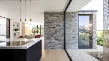 Moderne Villa mit Steinstreifen | BAAS-Architecten