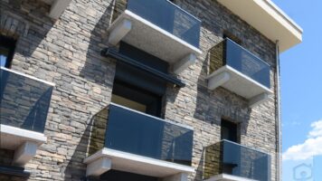 Apartmentkomplex mit Außenfassade aus Vesio Stone Strips